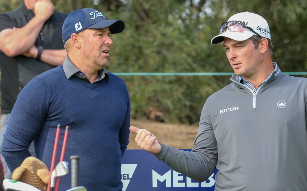 Ryan Fox and Shane Warne during a Pro AM