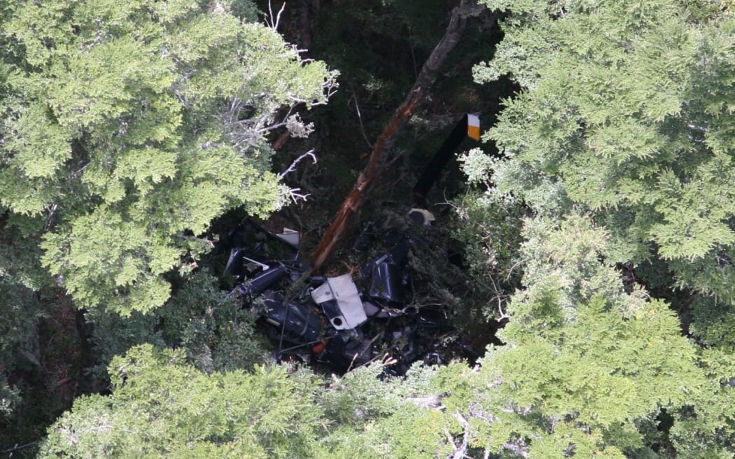Wreckage of the Robinson 44 helicopter that crashed on Thursday in a valley near Queenstown.