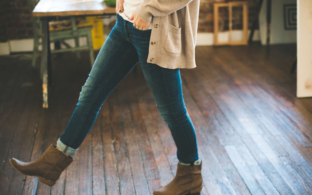 Woman wearing jeans (stock photo)