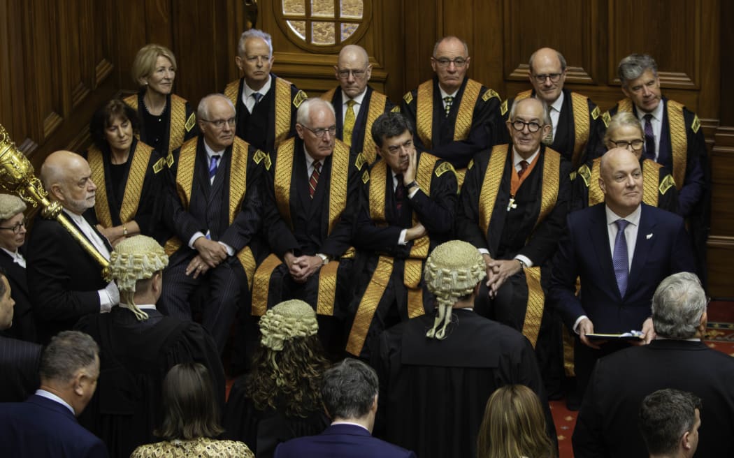 Members of the judiciary are seated to hear the Speech from the Throne.