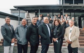 From left Andre LeGeyt (Te Taiwhenua o Heretaunga chief of operations), Albie Hawea (Hikoi Charitable Trust), Sam Christie (Āwhina Whānau Services, GM) Minister Peeni Henare, Waylyn Tahuri-Whaipakanga (Te Taiwhenua o Heretaunga CEO), Lum Tahuri (Pou Tikanga, Te Taiwhenua o Heretaunga).