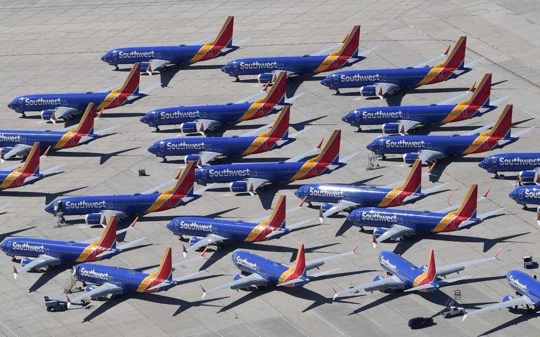 Southwest Airlines Boeing 737 MAX aircraft are parked on the tarmac after being grounded, at the Southern California Logistics Airport in Victorville, California on March 28, 2019.