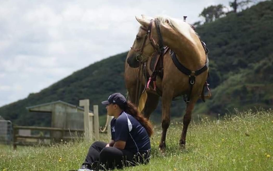 Black Ferns prop Aleisha-Pearl Nelson with one of her horses.