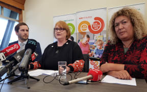 (from left ) NZEI Te Riu Roa vice president Liam Rutherford; NZEI Te Riu Roa president Lynda Stuart; Russell School principal Sose Annandal.