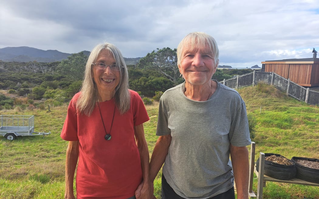 Joanna Piekarski (left) and husband, Ro, on Great Barrier Island.