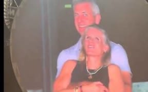 Couple busted on 'Kiss Cam' at Coldplay concert.