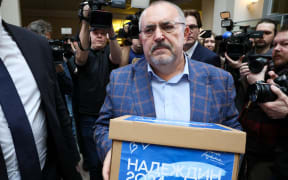 Boris Nadezhdin, the Civic Initiative Party presidential hopeful, arrives at the Central Election Commission to submit signatures collected in support of his candidacy, in Moscow on January 31, 2024. (Photo by Vera Savina / AFP)