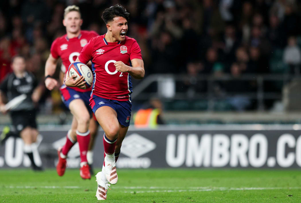 Marcus Smith scored a try against Tonga four minutes after being struck in the head.