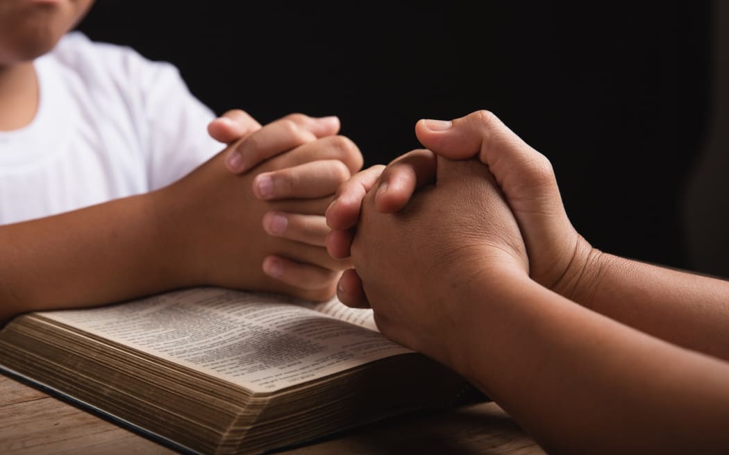 Children praying.