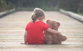 Child with teddybear