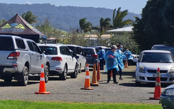 A steady flow of people have been going through a testing centre near Kaiaua on the Firth of Thames following the discovery of three Covid-19 cases in the area, outside the level 4 boundary.