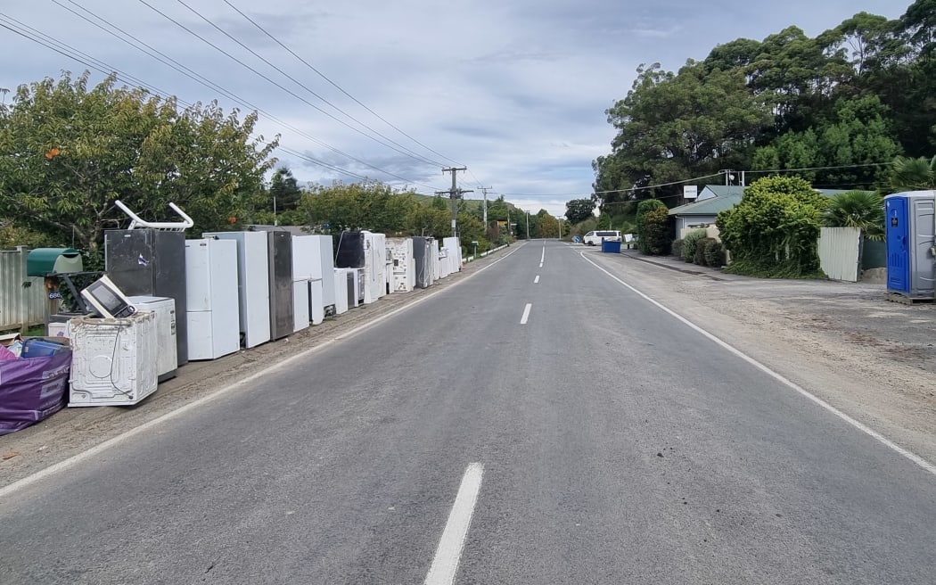 Appliances line part of the street in Puketapu.