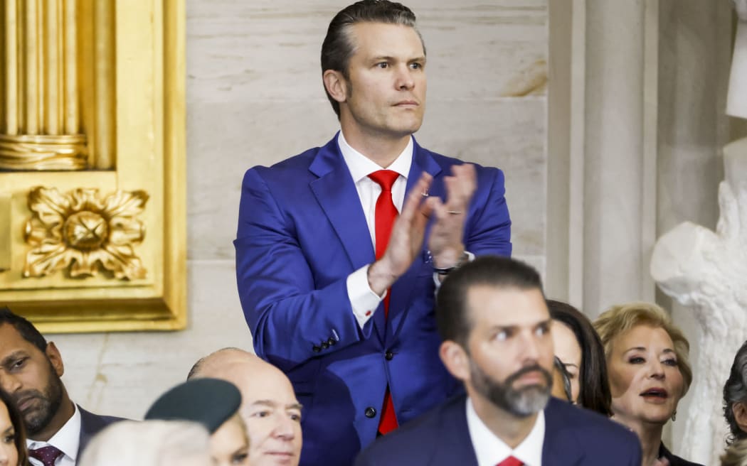 Pete Hegseth, Donald Trump’s nominee to be Secretary of Defense, applauds during Trump’s inauguration as the 47th President of the United States in the rotunda of the US Capitol in Washington, DC, on January 20, 2025. Trump takes office for his second non-consecutive term as the 47th president of the United States. (Photo by SHAWN THEW / POOL / AFP)