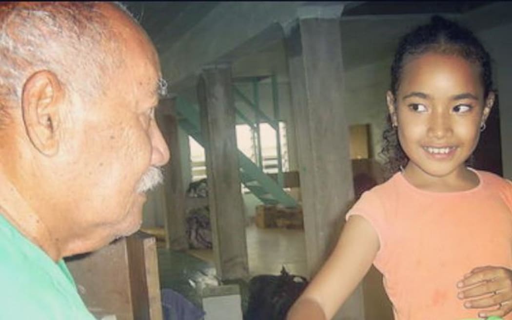 The late Tioni Pasilio and a young Elena Pasilio.