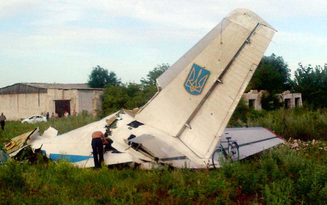 Wreckage of the Ukrainian AN-26 transport aircraft in Lugansk region.