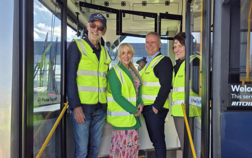 Auckland Mayor Wayne Brown, AT public transport and active modes director Stacy van der Putten, AT chief executive Dean Kimpton, and Ritchies chief executive Michele Kernahan.