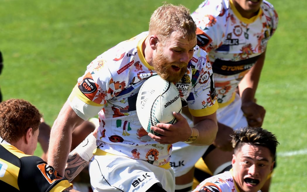 Mark Reddish is action for the Lions.