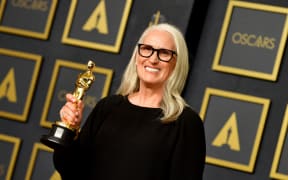 New Zealand director Jane Campion poses with the award for Directing "The Power Of The Dog" in the press room during the 94th Oscars at the Dolby Theatre in Hollywood, California on March 27, 2022.