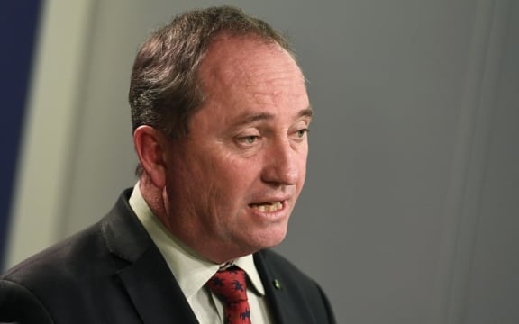 Australia's Deputy Prime Minister Barnaby Joyce addresses a press conference in Sydney on July 5, 2016. - Three days after polls closed the result is still too close to call, with Prime Minister Malcolm Turnbull's Liberal/National coalition and the opposition Labor party each short of the 76 seats needed to govern, raising the prospect of a hung parliament. (Photo by WILLIAM WEST / AFP)