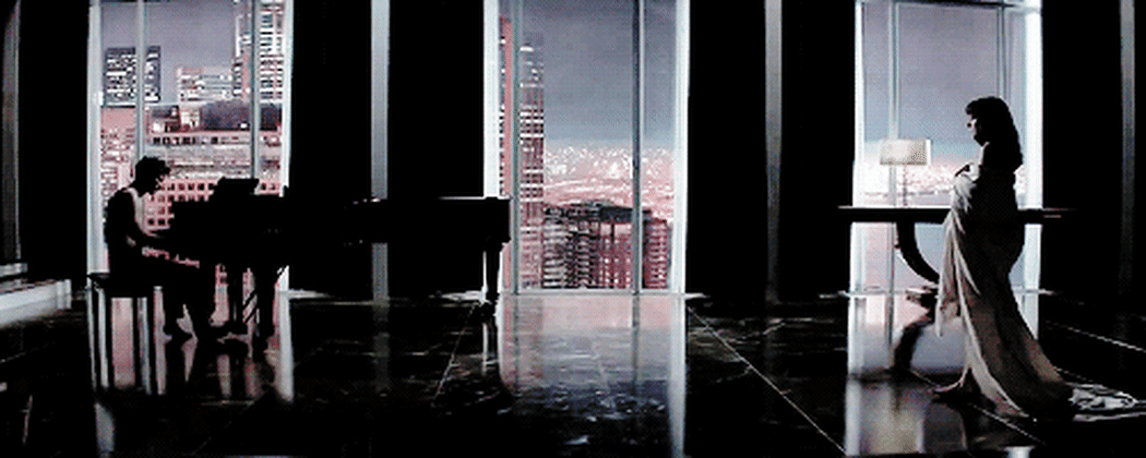 Lonely billionaire plays piano alone at night. I've seen this before somewhere.