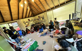 Glorious Oxenham teaching a Pidgin class to children in the Wellington Solomon Islands Community. 27 April 2024