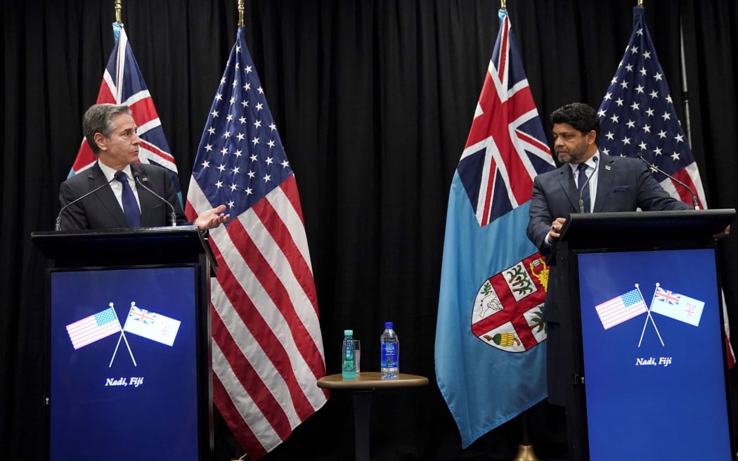 US Secretary of State Antony Blinken (L) takes part in a joint press availability with Fiji's acting Prime Minister Aiyaz Sayed-Khaiyum in Nadi, Fiji on February 12, 2022.