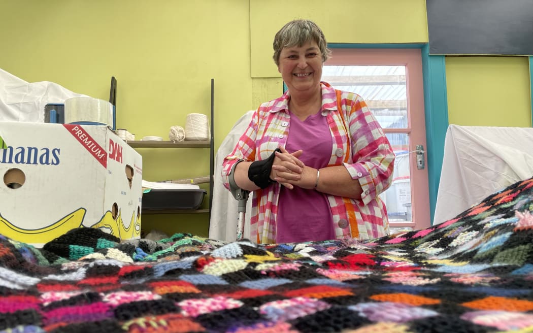 Gayle shows a throw made from recycled pieces