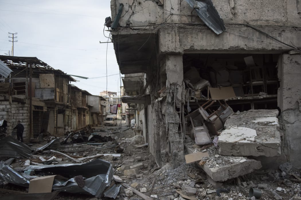 A house and a row of barns destroyed by a recent shelling in Stepanakert, a self-proclaimed Republic of the Nagorno-Karabakh.