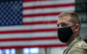 FORT DRUM, NEW YORK - DECEMBER 10: U.S. Army soldiers are briefed on COVID-19 quarantine procedures after returning home from a 9-month deployment to Afghanistan on December 10, 2020 at Fort Drum, New York.