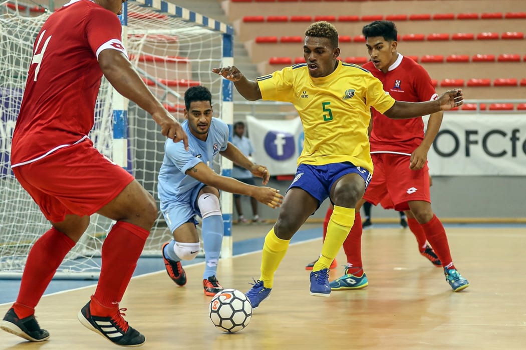 Solomon Island's Marlon Sia puts the Tongan defence under all sorts of pressure. OFC Futsal Nations Cup 2019.