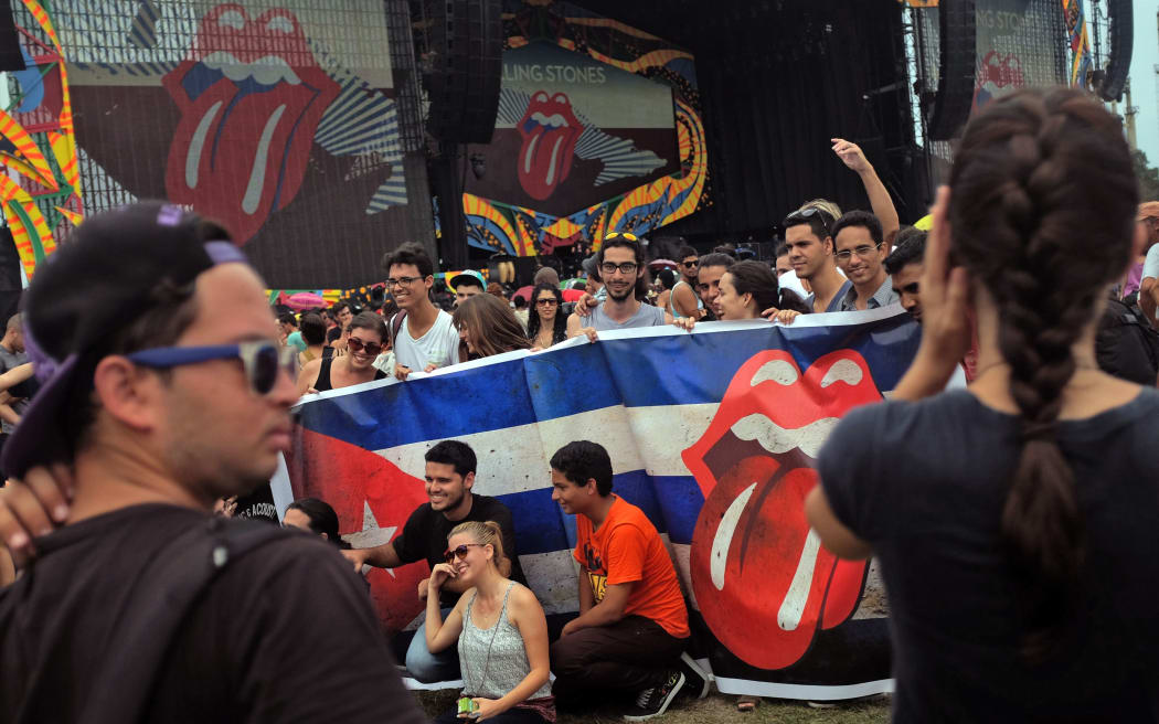 Fans wait for a free Rolling Stones concert to begin in Havana.
