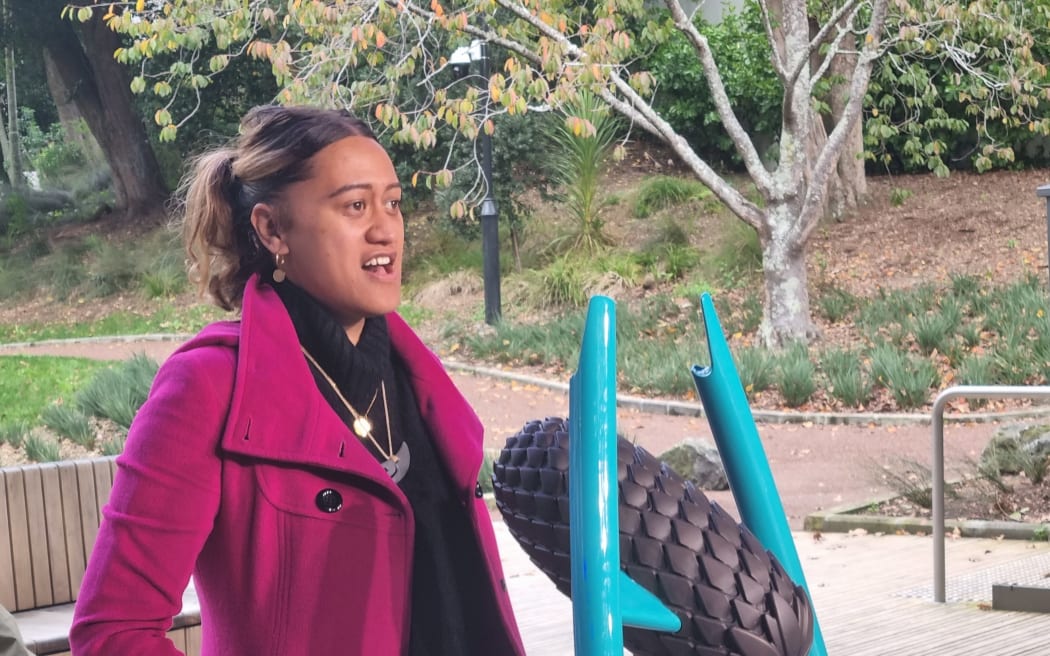 Composer Tarumai-i-Tawhiti Kerehoma-Hoani at the interactive sculpture in Auckland central.