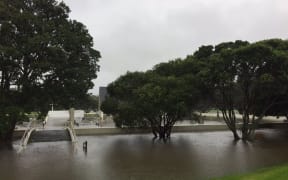 The flooded cemetery and church at Okahu Bay in Orakei.
