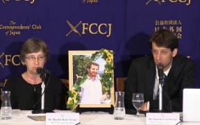 Martha Savage, left, and Patrick Savage at a news conference in