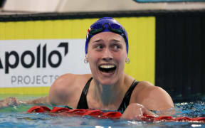 Hazel Ouwehand in disbelief after hitting the Paris 2024 qualification time and breaking the New Zealand record in the 100m Butterfly at the 2024 NZ Swimming Champs. (credit BW Media)