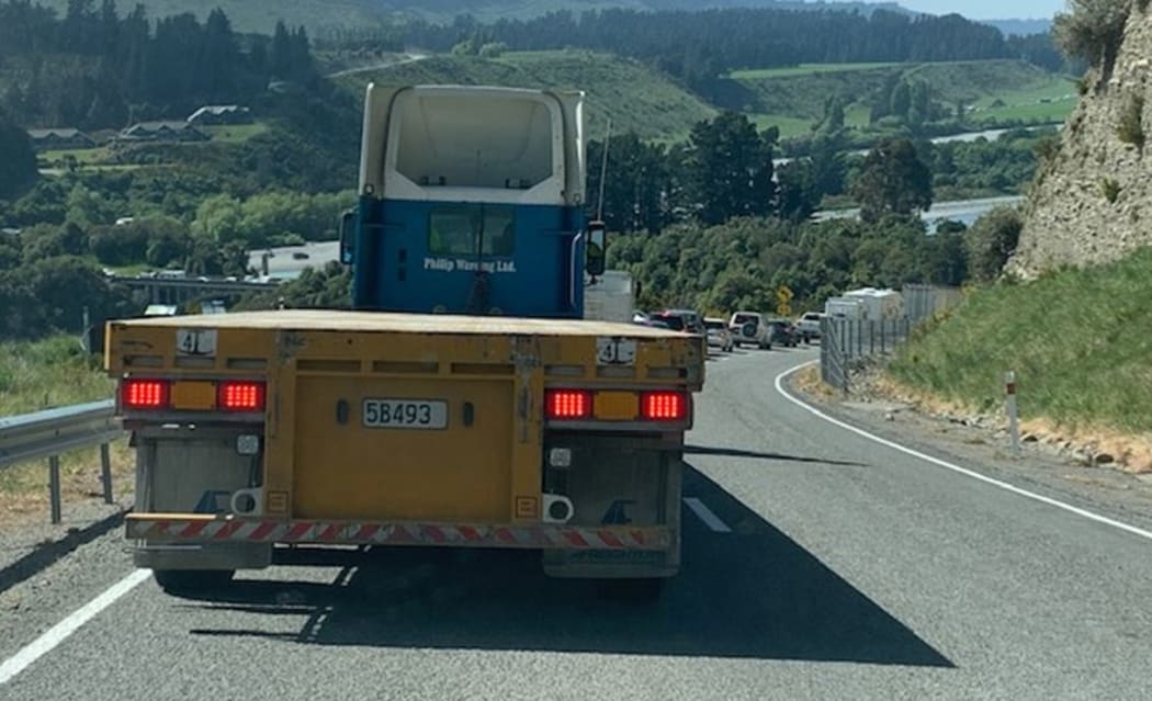 Traffic is building up after the lower Rakaia Bridge was closed after a crash between a motorcyclist and a truck.
