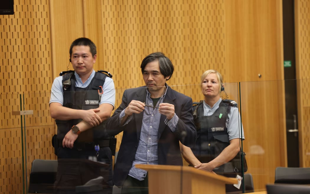 Tingjun Cao in the dock of the Christchurch High Court facing the jury on a charge of murder relating to real estate agent Yanfei Bao. Credit: Peter Meecham/The Press