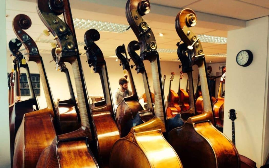 2016 Patricia Pratt Scholarship winner Alex Verster choosing a bass for his music school audition at Thwaites Fine Stringed Instruments in London