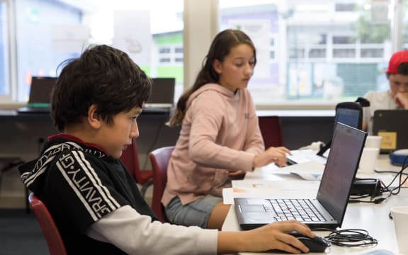 Davey, a member of the computer coding club set up by Ron Amosa, working on a coding exercise.