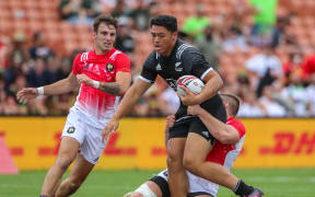 Caleb Clarke heads for the line against France