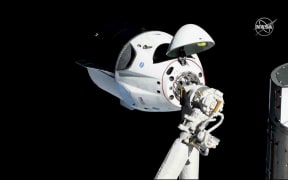 The SpaceX Crew Dragon is pictured about 20 meters (66 feet) away from the International Space Station'ss Harmony module, Sunday, March 3, 2019.