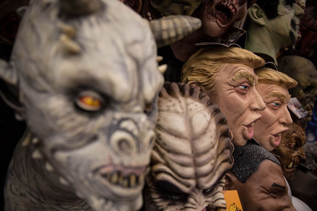 Donald Trump masks are displayed at a Halloween costume store in Mexico. Trump costumes are proving popular in New Zealand too this year.