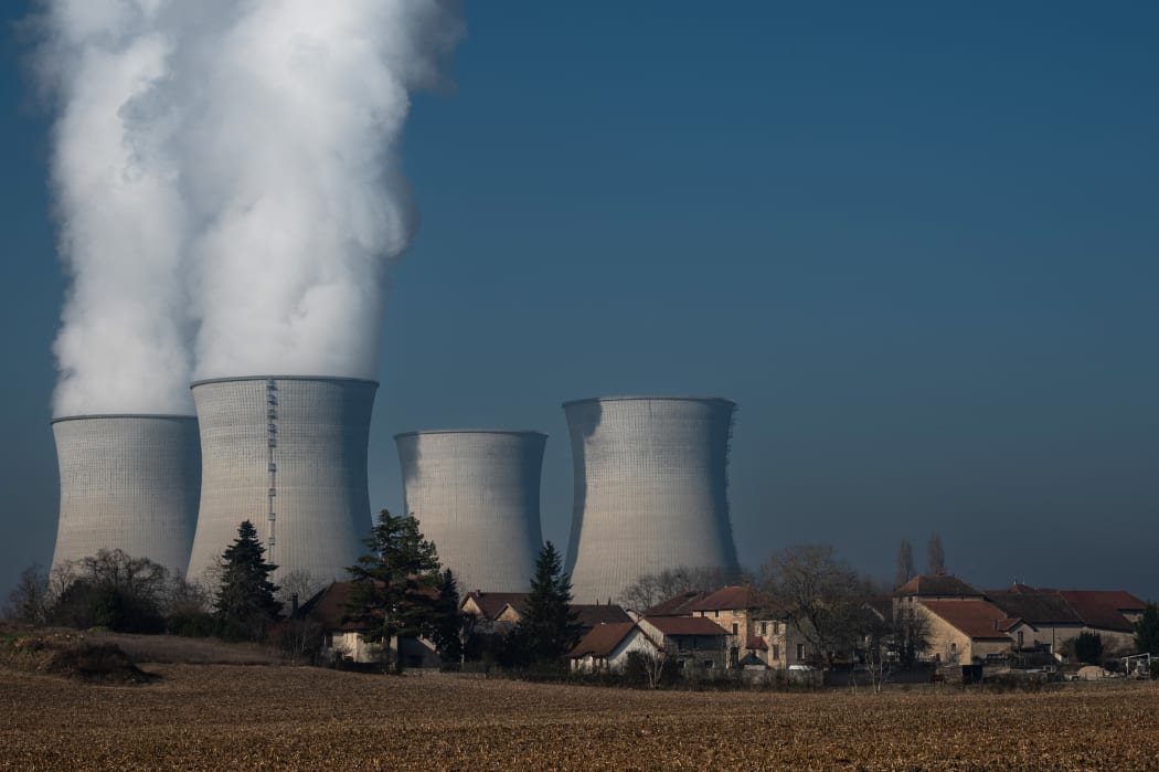 Smoke rising from chimneys of the Bugey nuclear power plant on January 25, 2022, in Saint-Vulbas, central eastern France.