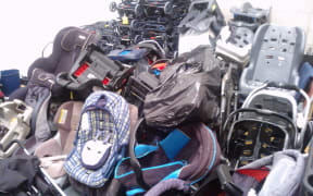 Car restraints awaiting disposal
