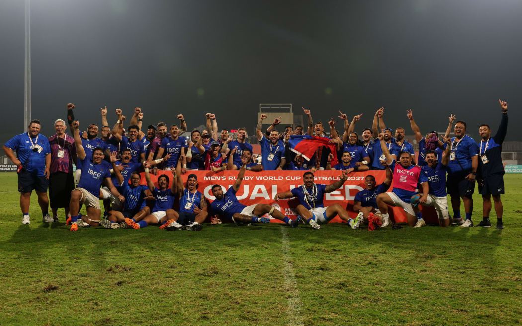 DUBAI, UNITED ARAB EMIRATES - NOVEMBER 18: Players of Samoa celebrates victory as they qualify for the 2027 rugby world cup following the Men's Rugby World Cup 2027 Final Qualification Tournament match between Samoa and Belgium at The Sevens Stadium on November 18, 2025 in Dubai, United Arab Emirates. (Photo by Christopher Pike - World Rugby/World Rugby via Getty Images)