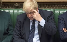 Britain's Prime Minister Boris Johnson gestures in the House of Commons in London on September 3, 2019.