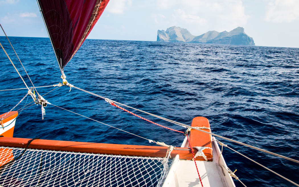 A rugged Pacific island as seen from Hikianalia.