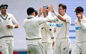 New Zealand bowler Matt Henry celebrates the wicket of Steve Smith.