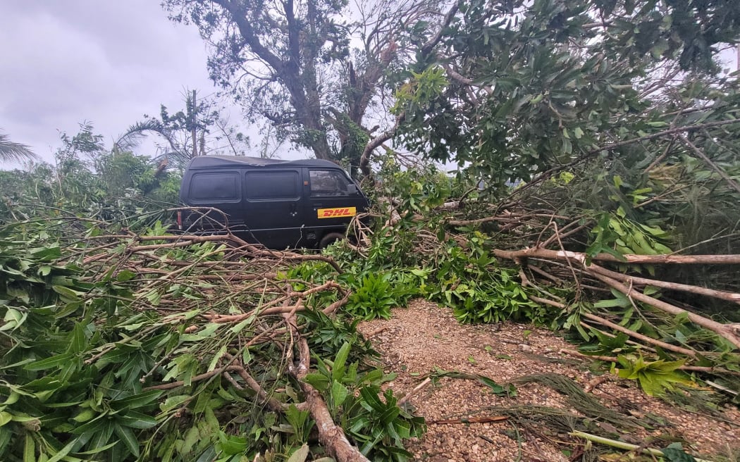 Port Vila Based Journalist Dan McGarry has a big clean up on his hands, this mess is at the end of his laneway.