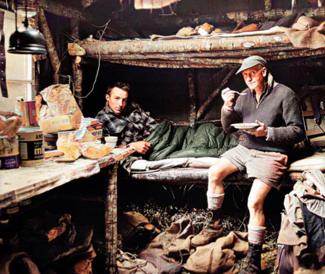 Two men in hut